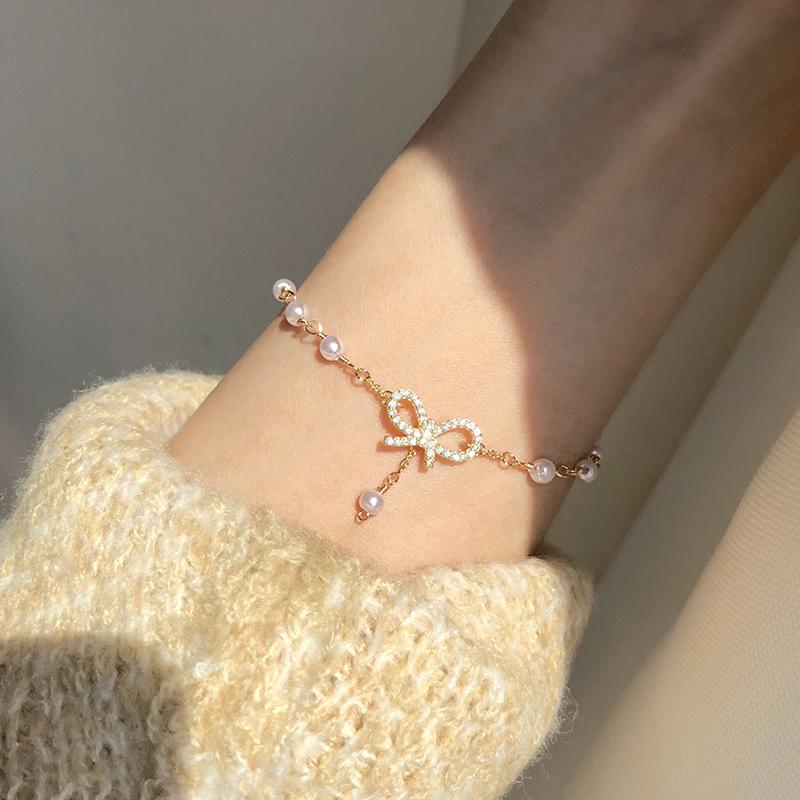 [HOT]Ins girl heart bow bracelet Korea sweet simple versatile Sen honey girlfriend interval pearl jewelry [JDB]]