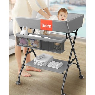Changing table, baby care table, operation touch, foldable portable bed, bathing operation, changing diaper, wet baby