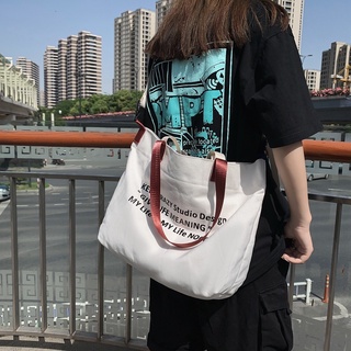 Large-capacity portable tote bag black and white all-match shoulder bag student messenger bag men and women messenger bag canvas bag