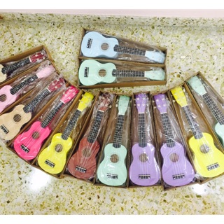 Ukelele for beginners in various colours inclusive of a music guide good for a gift set